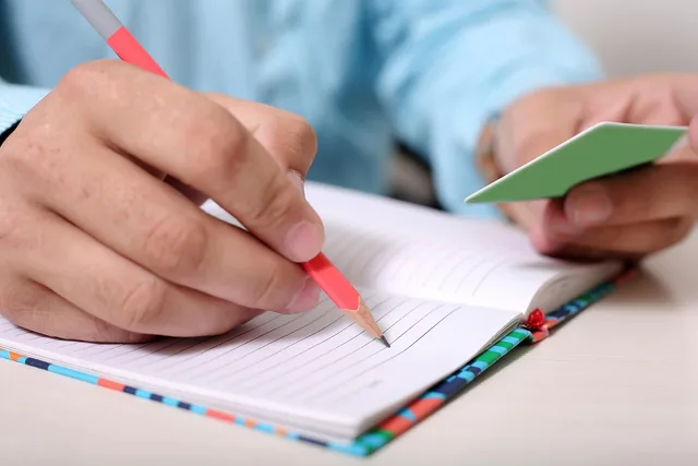 man, notebook, write, writing, person, men, work, table, adult, people, office, study, male, pencil, card, hand, education, paper, copy, note, book, desk. Distinguishing a target account from a buyer persona