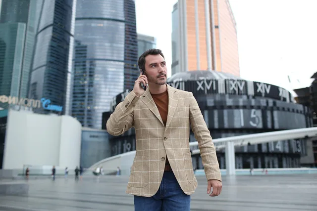 man, businessman, city, male, guy, person, handsome, suit, fashion, phone call, outdoors, moscow, portrait, handsome, phone call, phone call, phone call, phone call, phone call. Finding a relevant business reason to contact an account