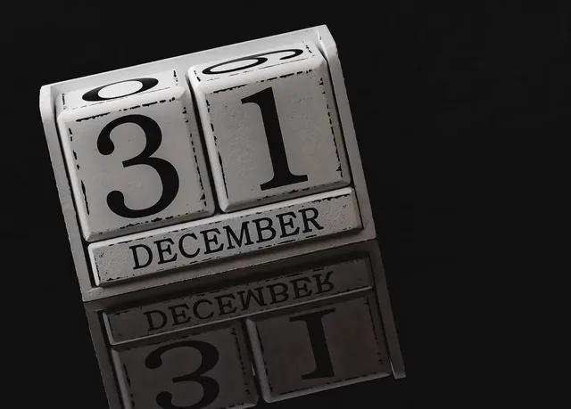 Close-up of a perpetual calendar displaying December 31st, reflecting on a black surface. Giving each follow-up a distinct reason to exist